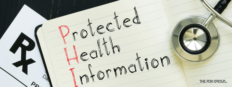 A piece of paper that says "Protected Health Information" (PHI).