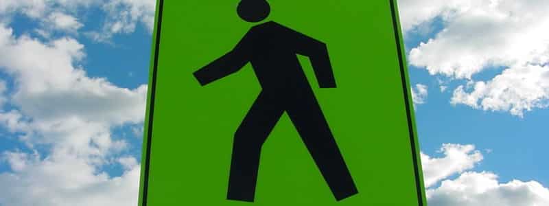 businessman-walking-sign